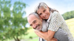 Older couple who restore their smiles with All on 4 whole mouth dental implants in Grapevine