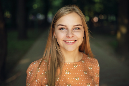 woman in orange shirt