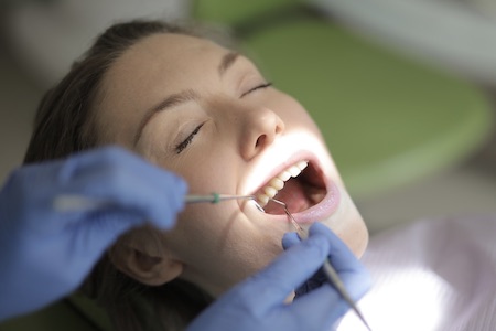 woman receiving dental treatment