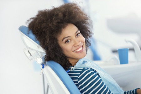 Woman smiling after receiving laughing gas dental sedation in Grapevine.