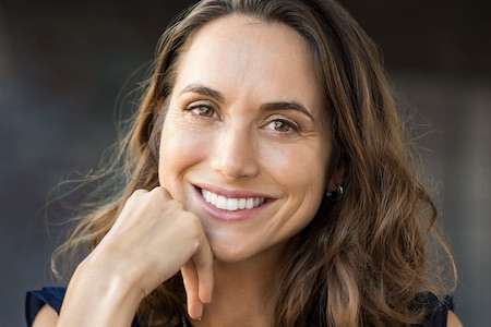 restorative dentistry with dental crown and dental bridge in Grapevine