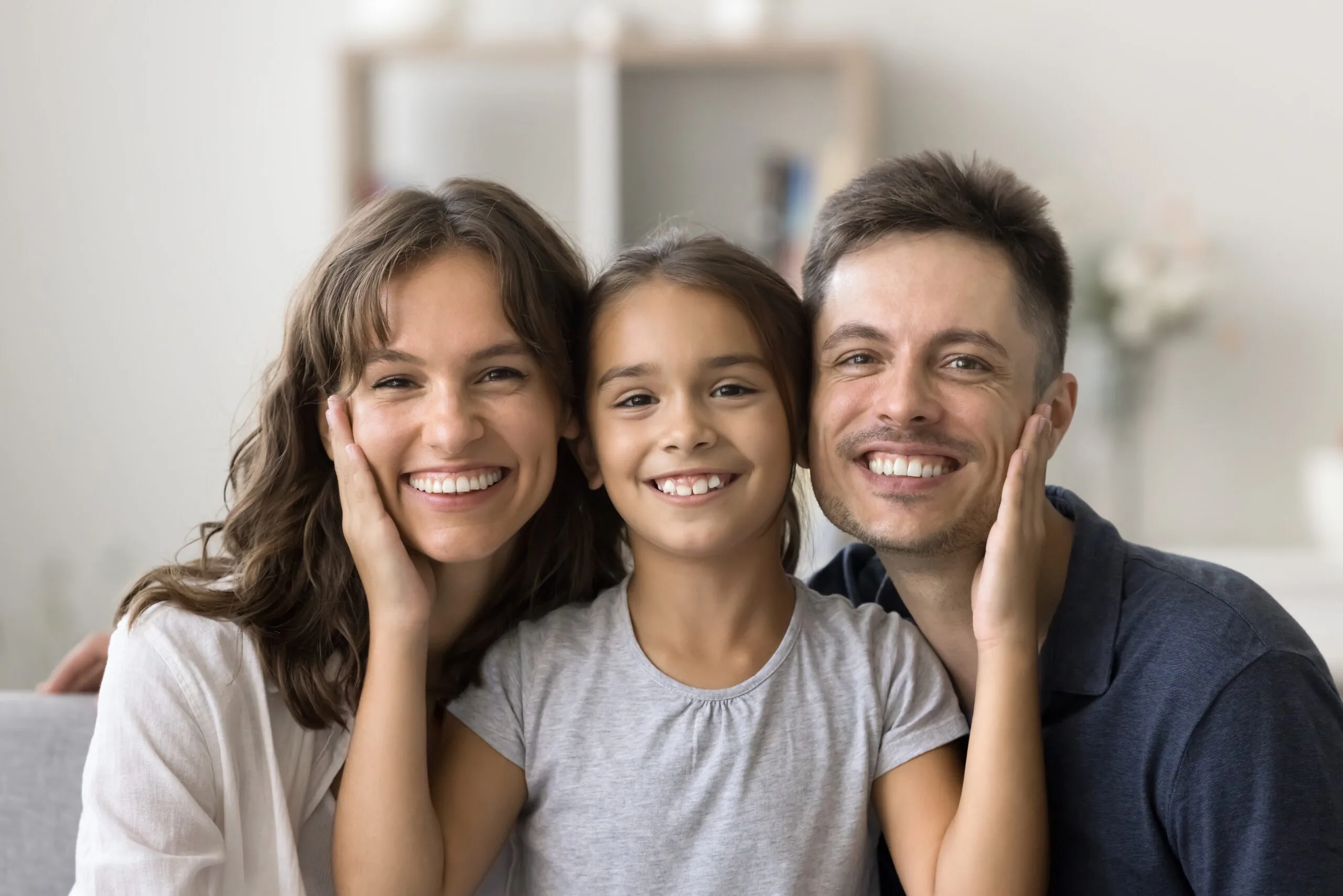 happy family smiling, little girl with parents, healthy white smiles